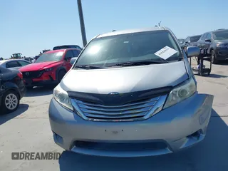 2014 Toyota Sienna LE AAS with VIN 5TDKK3DC4ES447265, listed as a IAAI auction lot 42024631 with 112,890 mi miles and . Bid and sale history available at carsss.com. Image 12.