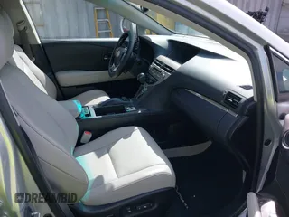 2015 Lexus RX 450h with VIN 2T2ZB1BA4FC002602, listed as a IAAI auction lot 41812562 with 166,220 mi miles and . Bid and sale history available at DreamBid. Image 5.