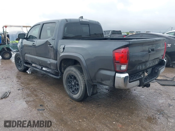 2022 Toyota Tacoma SR5 with VIN 3TMAZ5CN9NM195132, listed as a IAAI auction lot 42383482 with 51,011 mi miles and . Bid and sale history available at DreamBid. Image 3.