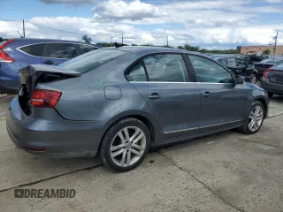 2017 Volkswagen Jetta SEL z VIN 3VWL17AJ6HM392174, wystawiony jako Copart lot #57771225 z przebiegiem 31 148 mil mil oraz Szkoda całkowita • Salvage title. Historia ofert i sprzedaży dostępna na DreamBid. Obrazek 3.