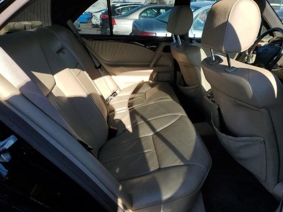 1997 Mercedes-Benz E-Class with VIN WDBJF55F4VJ034892, listed as a Copart auction lot 89406595 with 118,494 mi miles and Salvage Title. Bid and sale history available at carsss.com. Image 10.