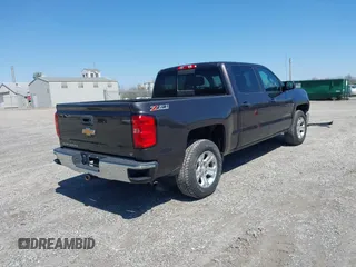 2015 Chevrolet Silverado 1500 LT with VIN 3GCUKREC8FG510992, listed as a IAAI auction lot 41966354 with 176,347 mi miles. Bid and sale history available at carsss.com. Image 4.