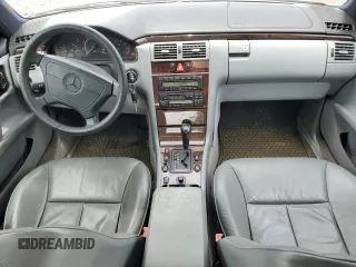 1997 Mercedes-Benz E-Class with VIN WDBJF72F7VA245827, listed as a Copart auction lot 56963154 with 63,162 mi miles and Clean Title. Bid and sale history available at carsss.com. Image 8.