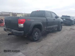 2009 Toyota Tundra 4WD Truck with VIN 5TFBW54119X091419, listed as a IAAI auction lot 41031994 with 214,922 mi miles. Bid and sale history available at carsss.com. Image 4.