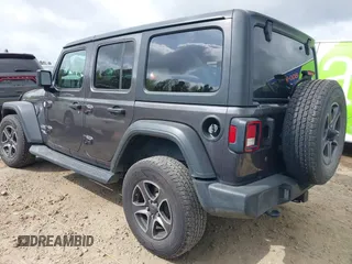 2018 Jeep Wrangler Unlimited Sport S z VIN 1C4HJXDG8JW112639, wystawiony jako IAAI lot #41951965 z przebiegiem 93 853 mil mil oraz . Historia ofert i sprzedaży dostępna na DreamBid. Obrazek 3.