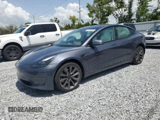 2023 Tesla Model 3 z VIN 5YJ3E1EA0PF571943, wystawiony jako Copart lot #58338235 z przebiegiem 41 584 mil mil oraz Szkoda całkowita • Salvage title. Historia ofert i sprzedaży dostępna na DreamBid. Obrazek 1.
