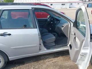 2003 Ford Focus SE Fleet с VIN 1FAFP36373W209641, выставлен на аукционе IAAI как лот 42119574 с пробегом 152 473 миль миль и . История ставок и продаж доступна на DreamBid. Изображение 5.