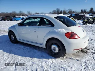 2014 Volkswagen Beetle with VIN 3VWHX7AT1EM617442, listed as a Copart auction lot 89093225 with 74,146 mi miles and Salvage Title. Bid and sale history available at DreamBid. Image 2.