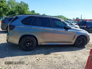 2014 BMW X5 xDrive35i z VIN 5UXKR0C5XE0K42788, wystawiony jako IAAI lot #42263399 z przebiegiem 138 644 mil mil oraz . Historia ofert i sprzedaży dostępna na DreamBid. Obrazek 13.