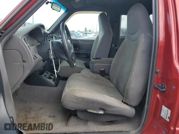 2002 Ford Ranger XL with VIN 1FTYR14V32TA65124, listed as a Copart auction lot 65009025 with 134,746 mi miles and Salvage title. Bid and sale history available at DreamBid. Image 7.
