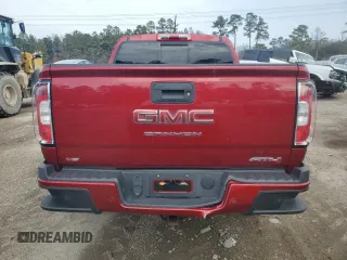 2021 GMC Canyon 4WD AT4 w/Leather with VIN 1GTG6FEN2M1224875, listed as a Copart auction lot 45553885 with 81,495 mi miles and Salvage Title. Bid and sale history available at carsss.com. Image 6.