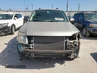 2010 Mercury Mariner with VIN 4M2CN8BG0AKJ09078, listed as a Copart auction lot 52863705 with 98,350 mi miles and Salvage title. Bid and sale history available at DreamBid. Image 5.