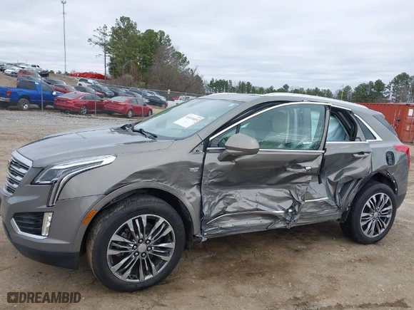 2018 Cadillac XT5 Premium Luxury FWD with VIN 1GYKNERS8JZ176653, listed as a IAAI auction lot 41631053 with 123,745 mi miles. Bid and sale history available at carsss.com. Image 6.