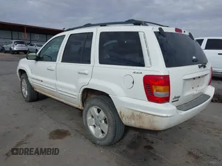2001 Jeep Grand Cherokee Limited with VIN 1J4GW58N21C560302, listed as a IAAI auction lot 41072475 with 172,529 mi miles. Bid and sale history available at carsss.com. Image 3.