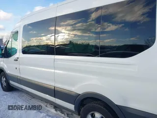 2018 Ford Transit Passenger XL z VIN 1FBAX2CM1JKA97858, wystawiony jako IAAI lot #41285058 z przebiegiem 252 805 mil mil oraz . Historia ofert i sprzedaży dostępna na DreamBid. Obrazek 14.