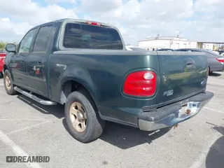 2001 Ford F-150 SuperCrew XLT with VIN 1FTRW07WX1KA43606, listed as a IAAI auction lot 41956736 with 278,543 mi miles. Bid and sale history available at carsss.com. Image 3.
