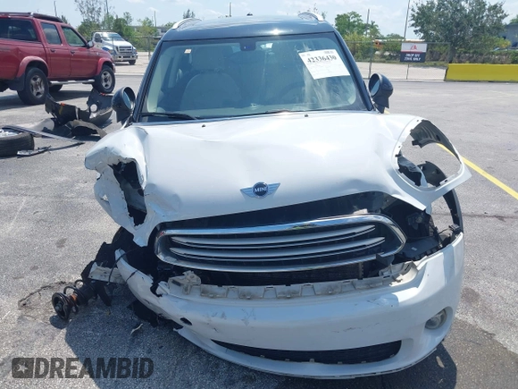 2015 MINI Countryman z VIN WMWZB3C53FWR43884, wystawiony jako IAAI lot #42336430 z przebiegiem 111 934 mil mil oraz . Historia ofert i sprzedaży dostępna na DreamBid. Obrazek 6.