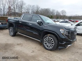 2023 GMC Sierra 1500 Denali Ultimate with VIN 1GTUUHEL1PZ225105, listed as a IAAI auction lot 41222732 with 18,795 mi miles. Bid and sale history available at carsss.com. Image 1.
