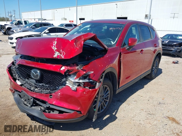 2020 Mazda CX-5 Touring with VIN JM3KFACM1L0756864, listed as a IAAI auction lot 41761131 with 16,646 mi miles and . Bid and sale history available at carsss.com. Image 2.