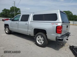 2017 Chevrolet Silverado 1500 LT with VIN 3GCUKREC3HG320455, listed as a Copart auction lot 57124395 with 119,683 mi miles and Salvage Title. Bid and sale history available at DreamBid. Image 2.