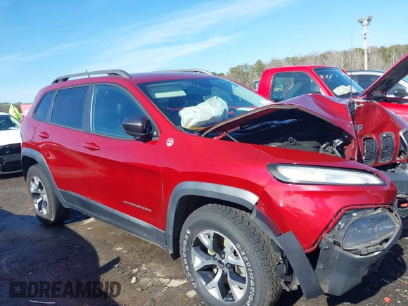 2014 Jeep Cherokee Trailhawk with VIN 1C4PJMBS0EW257133, listed as a IAAI auction lot 41446095 with 82,285 mi miles and . Bid and sale history available at DreamBid. Image 13.