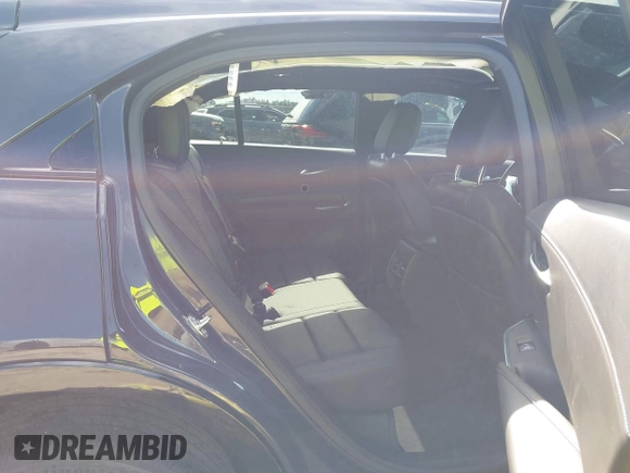2024 Cadillac XT4 FWD Sport with VIN 1GYFZER40RF226384, listed as a IAAI auction lot 42220804 with 8,743 mi miles and . Bid and sale history available at DreamBid. Image 8.