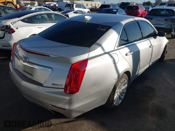 2015 Cadillac CTS AWD z VIN 1G6AW5SX2F0104981, wystawiony jako IAAI lot #41276740 z przebiegiem 87 128 mil mil oraz . Historia ofert i sprzedaży dostępna na DreamBid. Obrazek 4.