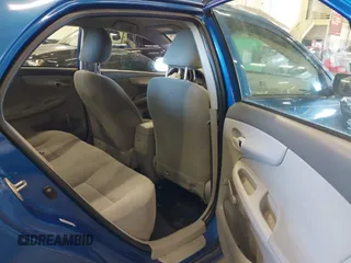 2009 Toyota Corolla with VIN 1NXBU40E19Z027256, listed as a IAAI auction lot 41383298 with 221,545 mi miles. Bid and sale history available at carsss.com. Image 8.