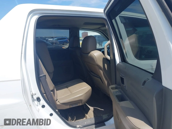 2007 Honda Ridgeline RTL z VIN 2HJYK16537H527957, wystawiony jako IAAI lot #42098143 z przebiegiem 233 163 mil mil oraz . Historia ofert i sprzedaży dostępna na DreamBid. Obrazek 8.