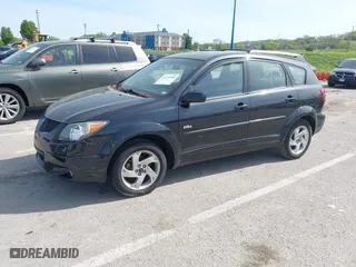 2004 Pontiac Vibe with VIN 5Y2SL62824Z401279, listed as a IAAI auction lot 42111585 with 184,200 mi miles. Bid and sale history available at carsss.com. Image 2.
