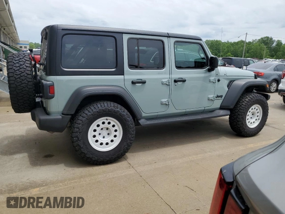 2023 Jeep Wrangler Sport with VIN 1C4HJXDN0PW643485, listed as a Copart auction lot 59783564 with 14,001 mi miles and Salvage Title. Bid and sale history available at DreamBid. Image 3.