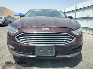 2017 Ford Fusion Titanium z VIN 3FA6P0SU8HR313773, wystawiony jako Copart lot #58791695 z przebiegiem 141 777 mil mil oraz Czysty tytuł • Clean title. Historia ofert i sprzedaży dostępna na DreamBid. Obrazek 5.