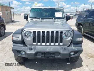 2021 Jeep Wrangler Unlimited Freedom z VIN 1C4HJXDN2MW544730, wystawiony jako IAAI lot #42624402 z przebiegiem 60 993 mil mil oraz . Historia ofert i sprzedaży dostępna na DreamBid. Obrazek 12.