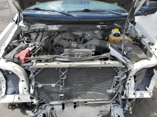 2014 Ford F-150 XL z VIN 1FTEX1EM6EKE25592, wystawiony jako Copart lot #55648365 z przebiegiem 105 736 mil mil oraz Szkoda całkowita • Salvage title. Historia ofert i sprzedaży dostępna na DreamBid. Obrazek 11.