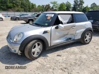 2010 MINI Hardtop with VIN WMWMF3C5XATZ25066, listed as a Copart auction lot 60396455 with 140,888 mi miles and Clean title. Bid and sale history available at DreamBid. Image 1.