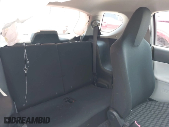 2012 Scion iQ with VIN JTNJJXB07CJ018562, listed as a IAAI auction lot 42404672 with 79,867 mi miles and . Bid and sale history available at DreamBid. Image 8.