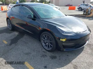 2022 Tesla Model 3 Long Range with VIN 5YJ3E1EB6NF233131, listed as a IAAI auction lot 41819409 with 38,308 mi miles. Bid and sale history available at carsss.com. Image 1.