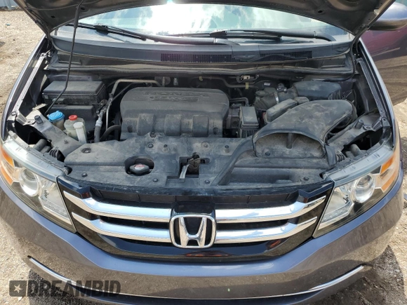 2016 Honda Odyssey EX-L z VIN 5FNRL5H65GB017067, wystawiony jako Copart lot #58424235 z przebiegiem 89 988 mil mil oraz Szkoda całkowita • Salvage title. Historia ofert i sprzedaży dostępna na DreamBid. Obrazek 12.