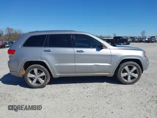 2014 Jeep Grand Cherokee Overland with VIN 1C4RJECG9EC206787, listed as a IAAI auction lot 41730875 with 194,196 mi miles. Bid and sale history available at carsss.com. Image 13.