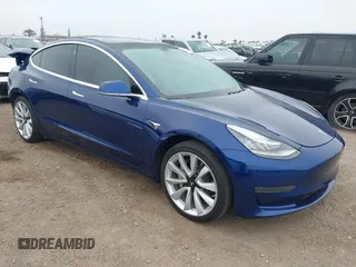 2020 Tesla Model 3 Standard Range Plus with VIN 5YJ3E1EA1LF802648, listed as a IAAI auction lot 42208034 with 27,231 mi miles and . Bid and sale history available at DreamBid. Image 1.