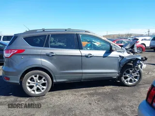 2013 Ford Escape SEL with VIN 1FMCU9H97DUD30608, listed as a IAAI auction lot 41800073 with 102,180 mi miles. Bid and sale history available at carsss.com. Image 13.