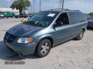 2005 Dodge Caravan SXT with VIN 2D8GP44L55R130702, listed as a IAAI auction lot 42090867 with 232,655 mi miles and . Bid and sale history available at carsss.com. Image 2.