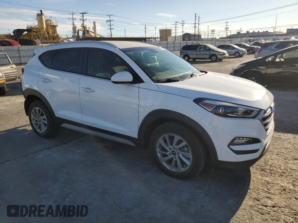 2017 Hyundai Tucson SE with VIN KM8J33A40HU493628, listed as a Copart auction lot 80683164 with 71,374 mi miles and Salvage Title. Bid and sale history available at DreamBid. Image 4.