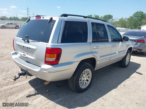 2002 Jeep Grand Cherokee Limited with VIN 1J8GW58S62C253818, listed as a IAAI auction lot 41983592 with 165,378 mi miles. Bid and sale history available at carsss.com. Image 4.