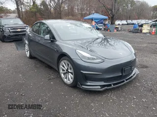 2022 Tesla Model 3 with VIN 5YJ3E1EA6NF143839, listed as a IAAI auction lot 40905007 with 83,897 mi miles and . Bid and sale history available at DreamBid. Image 12.