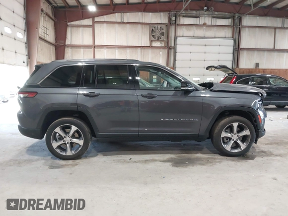 2022 Jeep Grand Cherokee with VIN 1C4RJYB65N8758560, listed as a IAAI auction lot 42182021 with 28,096 mi miles and . Bid and sale history available at DreamBid. Image 12.