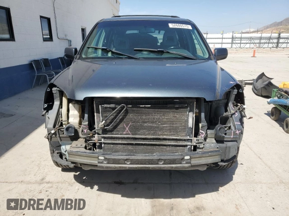 2005 Honda Pilot EX-L with VIN 5FNYF18525B038846, listed as a Copart auction lot 52600515 with 199,683 mi miles and Salvage Title. Bid and sale history available at carsss.com. Image 5.