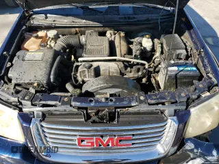 2007 GMC Envoy SLE z VIN 1GKDT13SX72118720, wystawiony jako Copart lot #88278185 z przebiegiem 212 605 mil mil oraz Szkody całkowita. Historia ofert i sprzedaży dostępna na DreamBid. Obrazek 12.