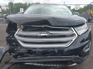 2016 Ford Edge SEL z VIN 2FMPK4J85GBC39388, wystawiony jako IAAI lot #42365493 z przebiegiem 70 591 mil mil oraz . Historia ofert i sprzedaży dostępna na DreamBid. Obrazek 13.