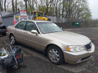 1999 Acura RL with VIN JH4KA9658XC007198, listed as a IAAI auction lot 42112631 with 92,166 mi miles. Bid and sale history available at carsss.com. Image 1.